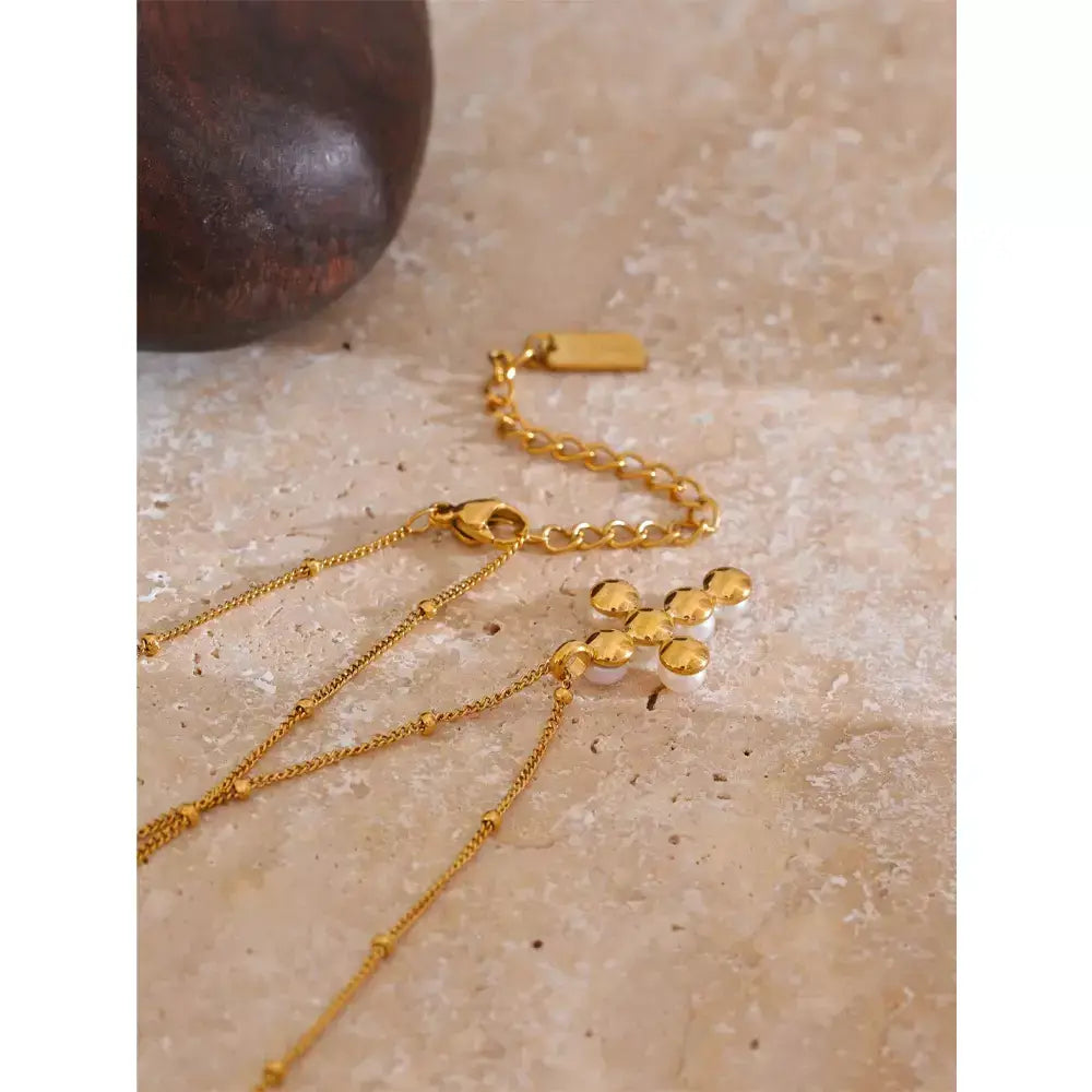 Colar Feminino Cruz de Pérola,
colar religioso moderno,
colar de luxo feminino,
colar cruz pérola,
Colar feminino elegante,
colar dourado