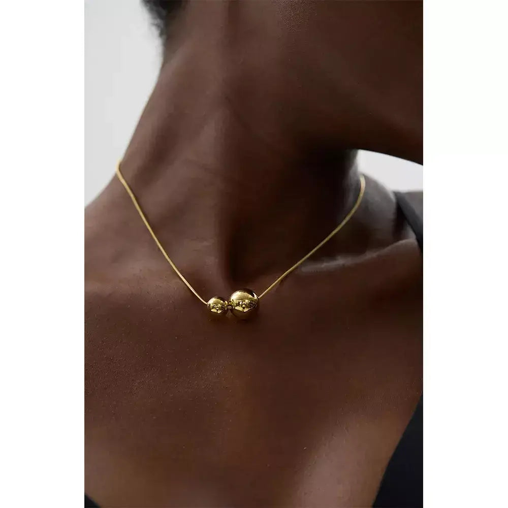 Colar Feminino Esferas,
Colar de bolinhas dourado,
colar feminino de bolinhas,
Colar elegante e sofisticado,
Colar dourado para presente,
Colar de esferas fashion