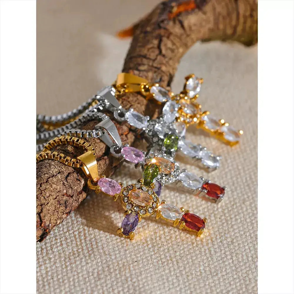Colar de Cruz com Zircônias Coloridas,
Colar de cruz,
Colar religioso,
Colar de zircônia,
Colar de luxo,
Colar de fé,
Colar com pingente de cruz,
Colar cristão feminino