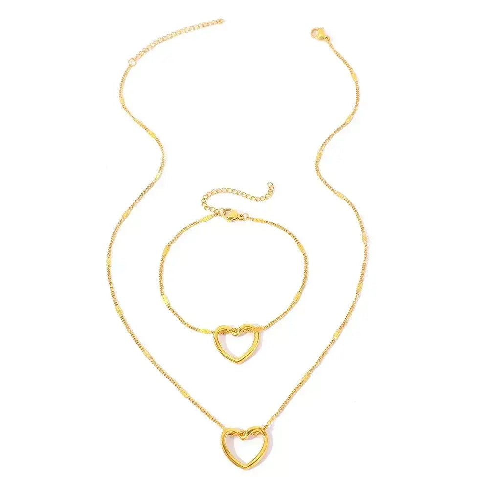 colar e pulseira feminino, colar e pulseira luxo, conjunto de joias elegante, joias femininas premium, colar e pulseira ouro 18K, presente para mulher sofisticada, conjunto coração entrelaçado, joias duráveis e elegantes