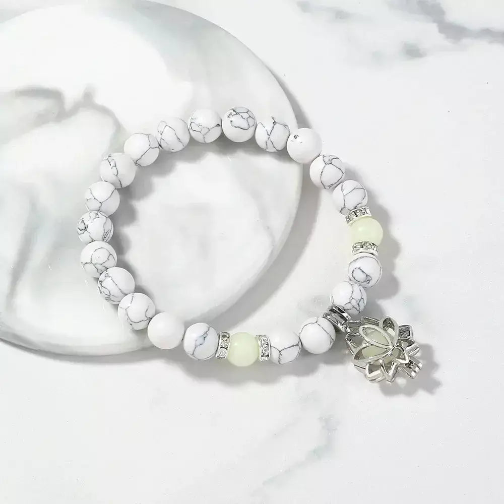 Pulseira Luminosa Lótus,
pulseira de pedra natural,
pingente de lótus,
pulseira yoga,
equilíbrio energético,
acessórios unissex