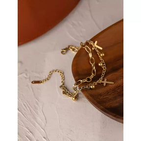 Pulseira Cruz Divina,
pulseira feminina religiosa,
pulseira católica,
Pulseira feminina banhada a ouro,
pulseira camadas