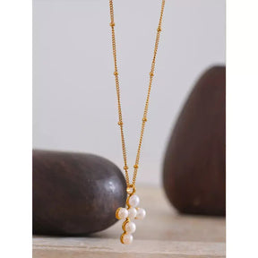 Colar Feminino Cruz de Pérola,
colar religioso moderno,
colar de luxo feminino,
colar cruz pérola,
Colar feminino elegante,
colar dourado