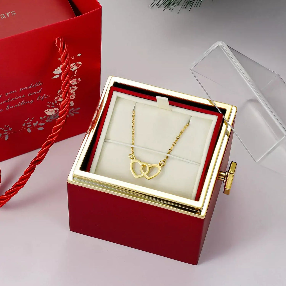 Colar Corações Duplo + Caixa Rotativa de Brinde
Colar Corações Entrelaçados + Caixa Rotativa de Brinde,
colar coração duplo,
presente Dia das Mães,
colar Dia das Mães,
presente para mãe,
colar de coração para mãe,
Colar Corações Entrelaçados,
colar e caixa de flor