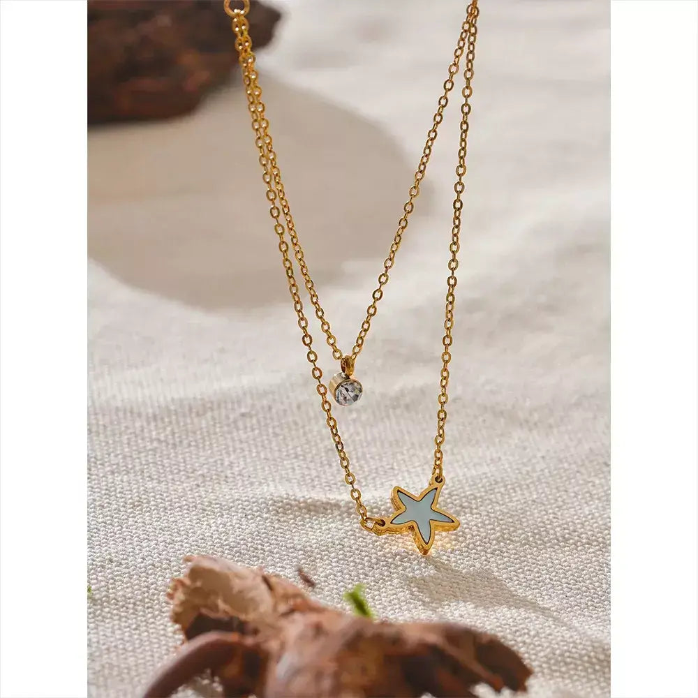 Colar Feminino Bela Estrela,
colar duplo feminino,
colar de concha natural,
colar com estrela e zircônia,
colar dourado em aço inoxidável,
colar elegante e sofisticado,
acessórios femininos de luxo,
colar para presentear