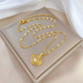 Colar Feminino Concha e Pérola de Zircônia,
Colar feminino elegante,
Colar de pérolas,
Colar estilo praia,
Acessório de aço inoxidável